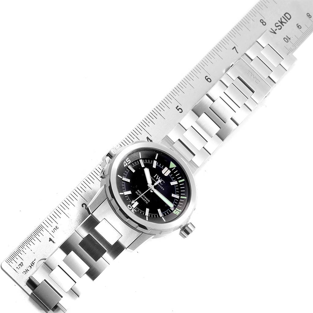 The IWC Aquatimer IW329002 Men's Stainless Steel Black Dial IW329002 Men's Stainless Steel Black Dial watch is displayed from a top view, showing the full face, bezel, and stainless steel bracelet.