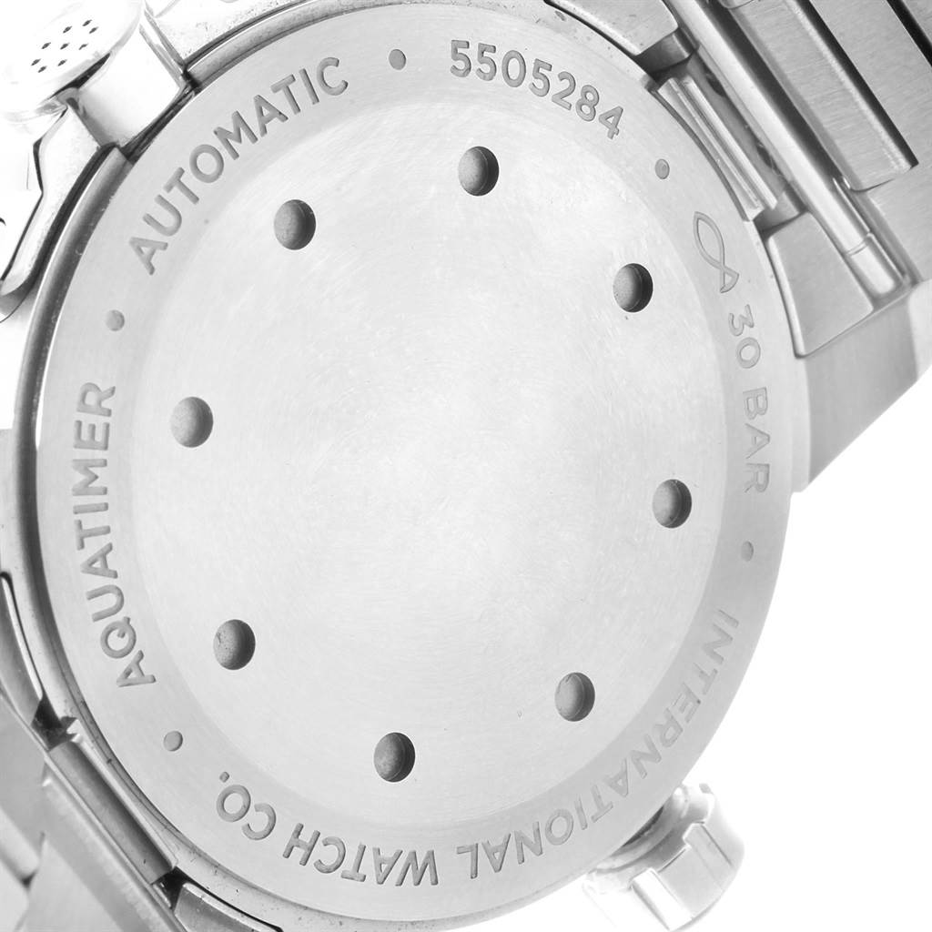 The image shows the backside of an IWC Aquatimer IW329002 Men's Stainless Steel Black Dial IW329002 Men's Stainless Steel Black Dial watch, displaying the case back, bracelet, and some engravings.