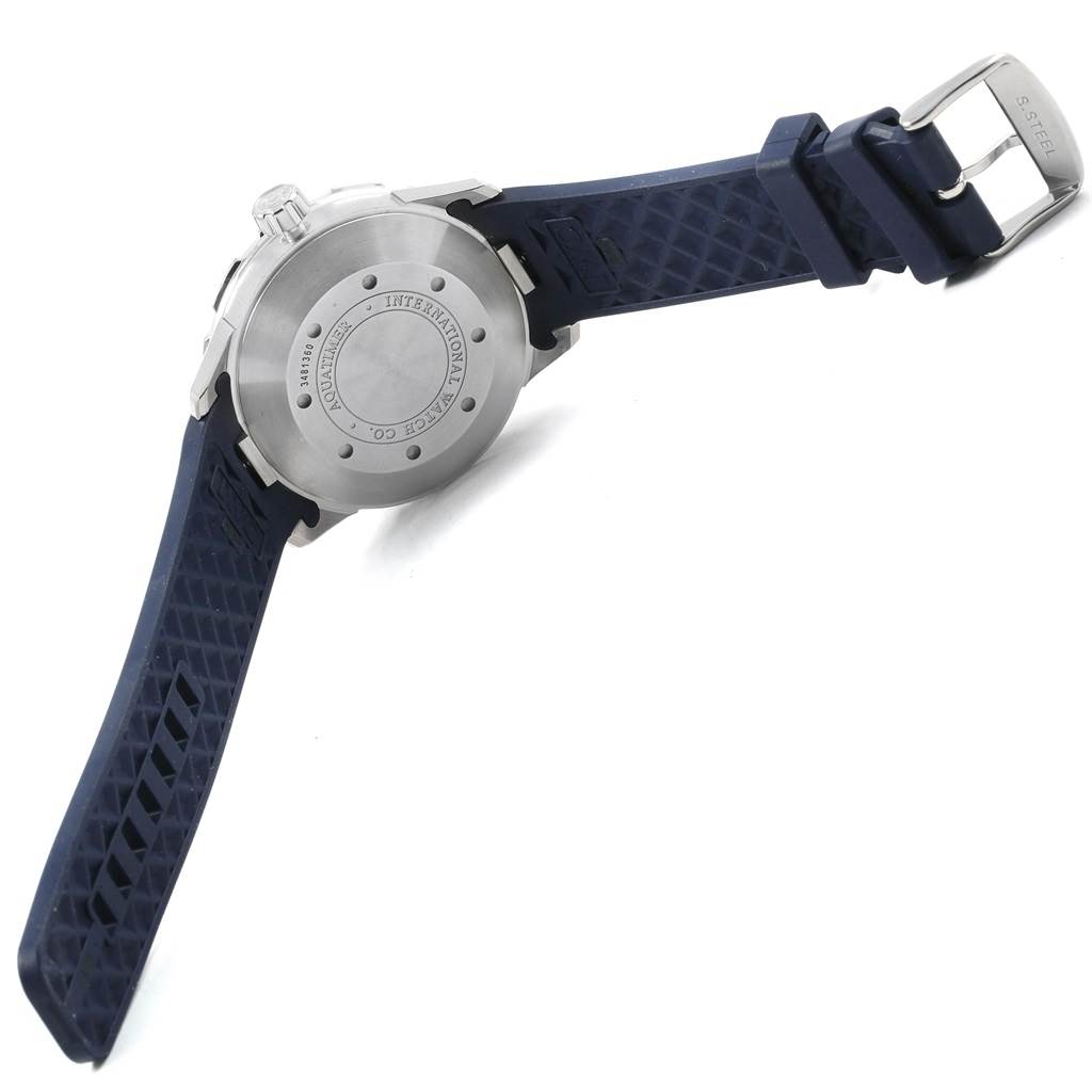 The IWC Aquatimer IW356805 Men's Stainless Steel White Dial IW356805 Men's Stainless Steel White Dial watch is shown from the back, highlighting the case back, crown, and blue rubber strap with a stainless steel buckle.