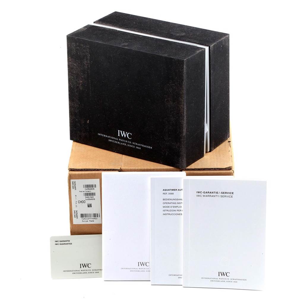The image shows the packaging and manuals for the IWC Aquatimer IW356805 Men's Stainless Steel White Dial IW356805 Men's Stainless Steel White Dial watch, including the black outer box, warranty card, and instruction booklets.