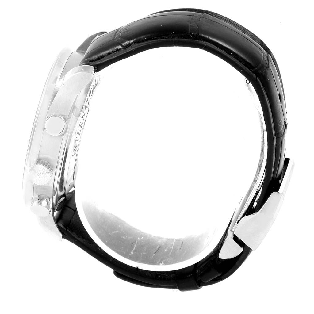 This image shows a side view of the IWC Portuguese IW371445 Men's Stainless Steel Silver Dial IW371445 Men's Stainless Steel Silver Dial model watch, highlighting the crown, case, and leather strap with the clasp.