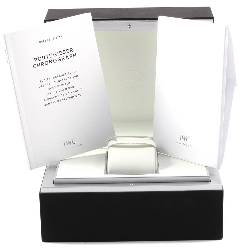 The image shows an IWC Portuguese IW371445 Men's Stainless Steel Silver Dial IW371445 Men's Stainless Steel Silver Dial Chronograph watch box and instruction manuals, captured from a front angle.