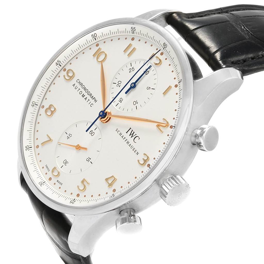 The image shows the dial, crown, and strap of the IWC Portuguese IW371445 Men's Stainless Steel Silver Dial IW371445 Men's Stainless Steel Silver Dial Chronograph model at an angle.