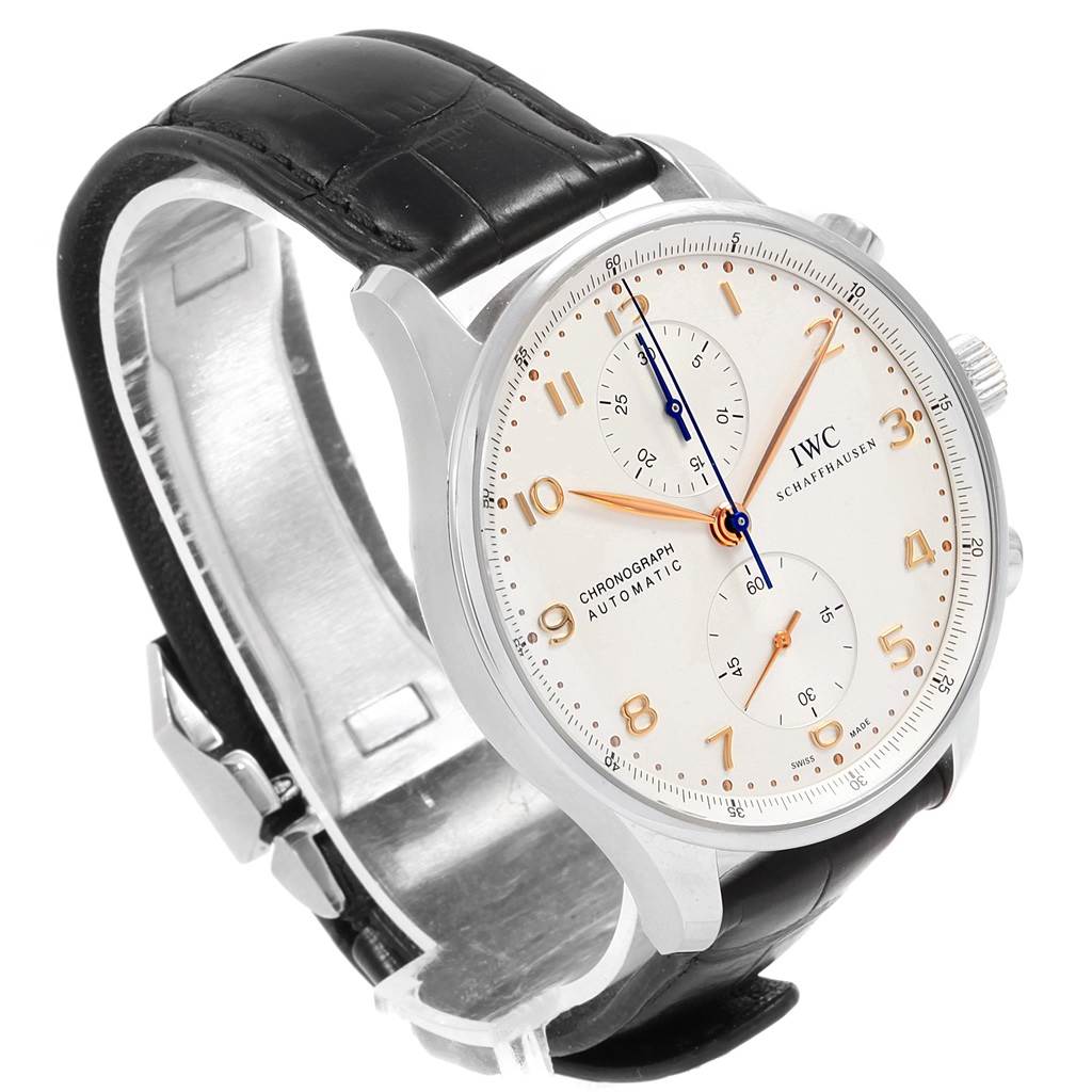 The IWC Portuguese IW371445 Men's Stainless Steel Silver Dial IW371445 Men's Stainless Steel Silver Dial watch is shown at a three-quarter angle, featuring its face, crown, and black leather strap.