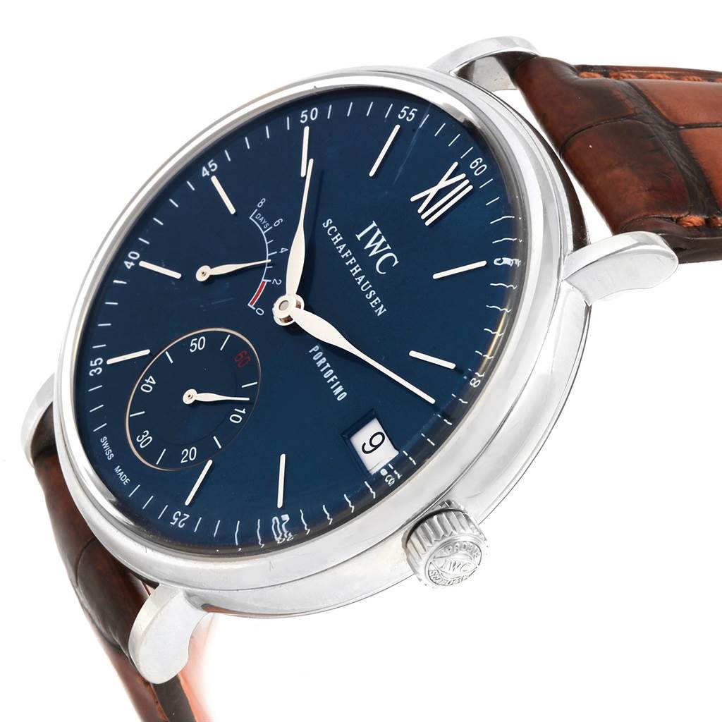 The image shows a front and side view of the IWC Portofino IW510106 Men
s Stainless Steel Blue Dial IW510106 Men
s Stainless Steel Blue Dial watch, displaying its blue dial, subdials, crown, and brown leather strap.