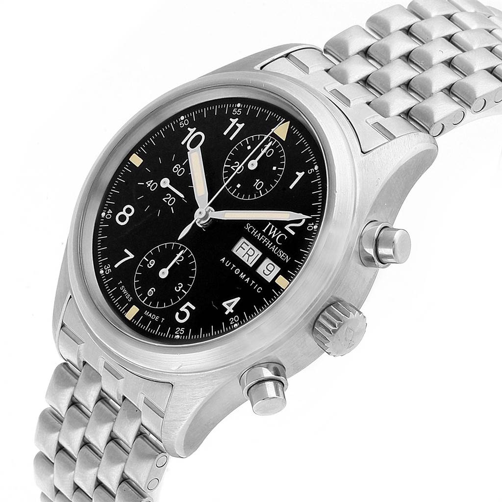 The image shows an IWC Pilot IW370607 Men
s Stainless Steel Black Dial IW370607 Men
s Stainless Steel Black Dial watch at an angled view, highlighting its black dial, chronograph subdials, crown, pushers, and metal bracelet.