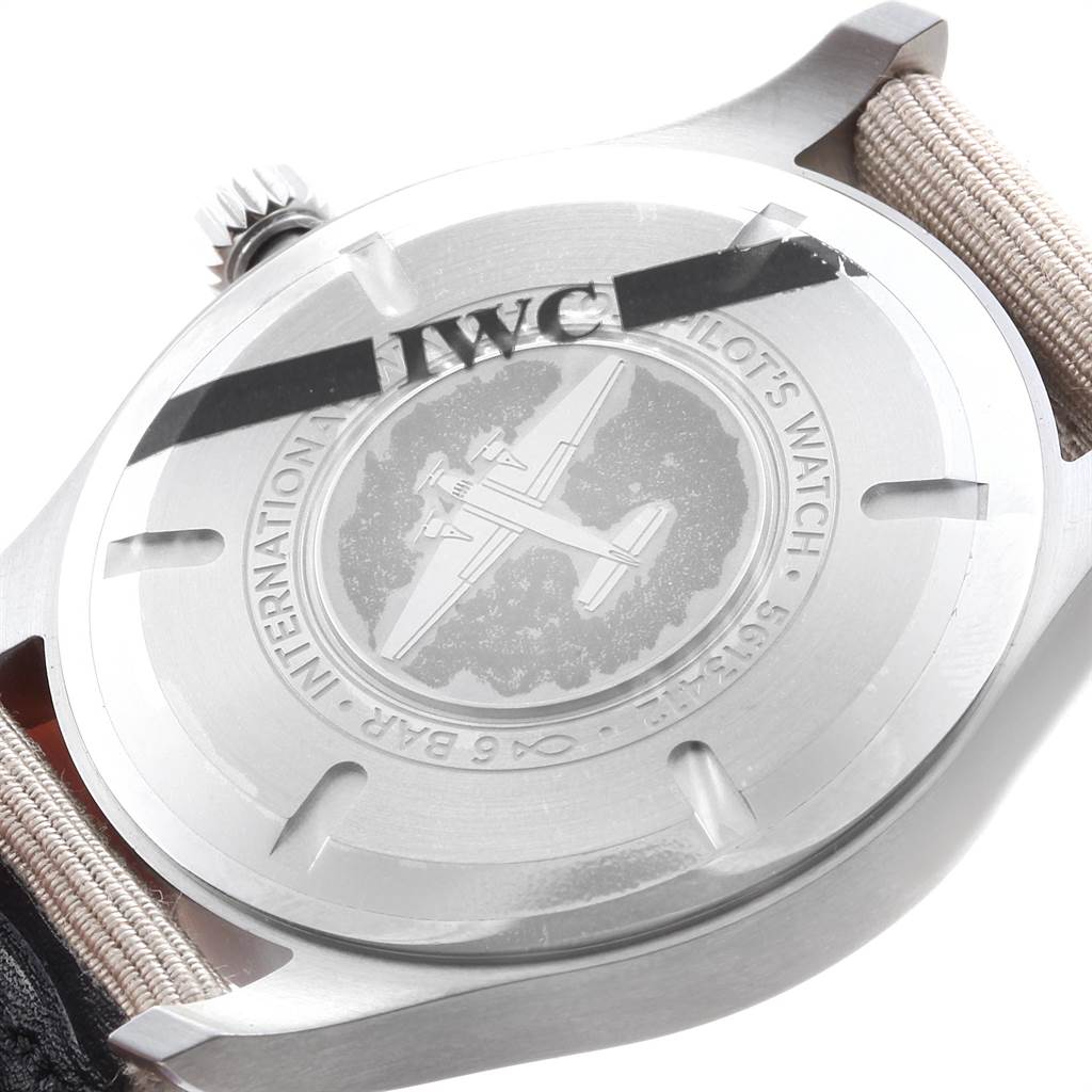 The image shows the back side and crown of the IWC Pilot IW327017 Men's Stainless Steel Silver Dial IW327017 Men's Stainless Steel Silver Dial model watch, highlighting the engraved case back.