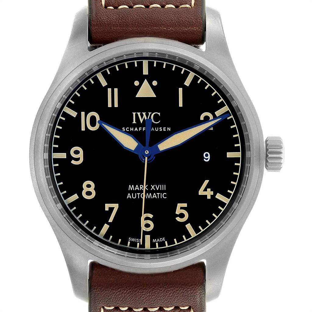 The image shows a front view of an IWC Pilot IW327006 Men's Titanium Black Dial IW327006 Men's Titanium Black Dial Mark XVIII Automatic watch, featuring a black dial and brown leather strap.