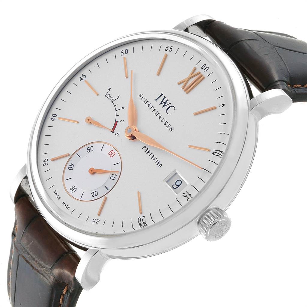 The IWC Portofino IW510103 Men's Stainless Steel Silver Dial IW510103 Men's Stainless Steel Silver Dial watch is shown at a slight angle, displaying the dial, crown, and part of the leather strap.