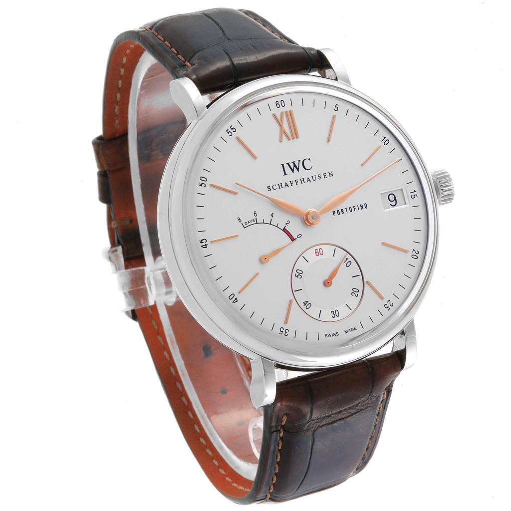 The image shows a side-angle view of the IWC Portofino IW510103 Men's Stainless Steel Silver Dial IW510103 Men's Stainless Steel Silver Dial watch, featuring its white dial, brown leather strap, and silver casing.