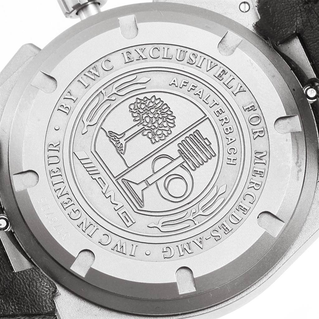 The image shows the case back of an IWC Ingenieur IW372504 Men's Titanium Black Dial IW372504 Men's Titanium Black Dial watch, featuring engraved details and branding.