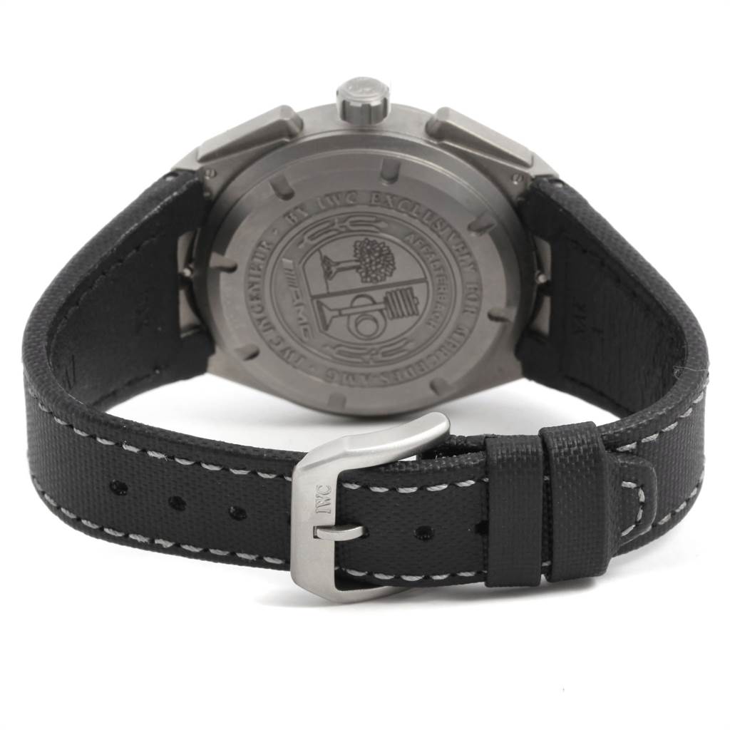 The IWC Ingenieur IW372504 Men's Titanium Black Dial IW372504 Men's Titanium Black Dial watch is shown from the back, highlighting the case back, strap, and buckle.