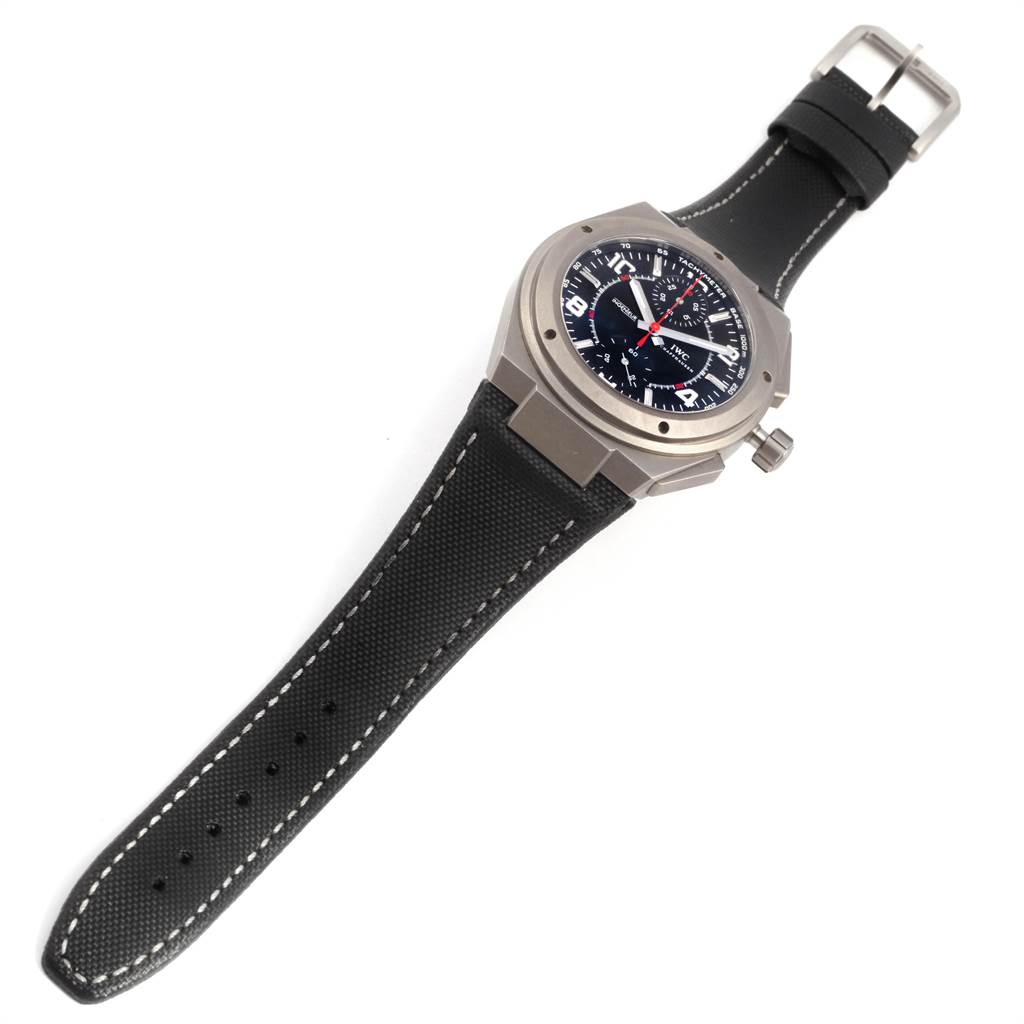 The image shows an IWC Ingenieur IW372504 Men's Titanium Black Dial IW372504 Men's Titanium Black Dial watch from an angled top view, displaying the face, case, crown, and strap.