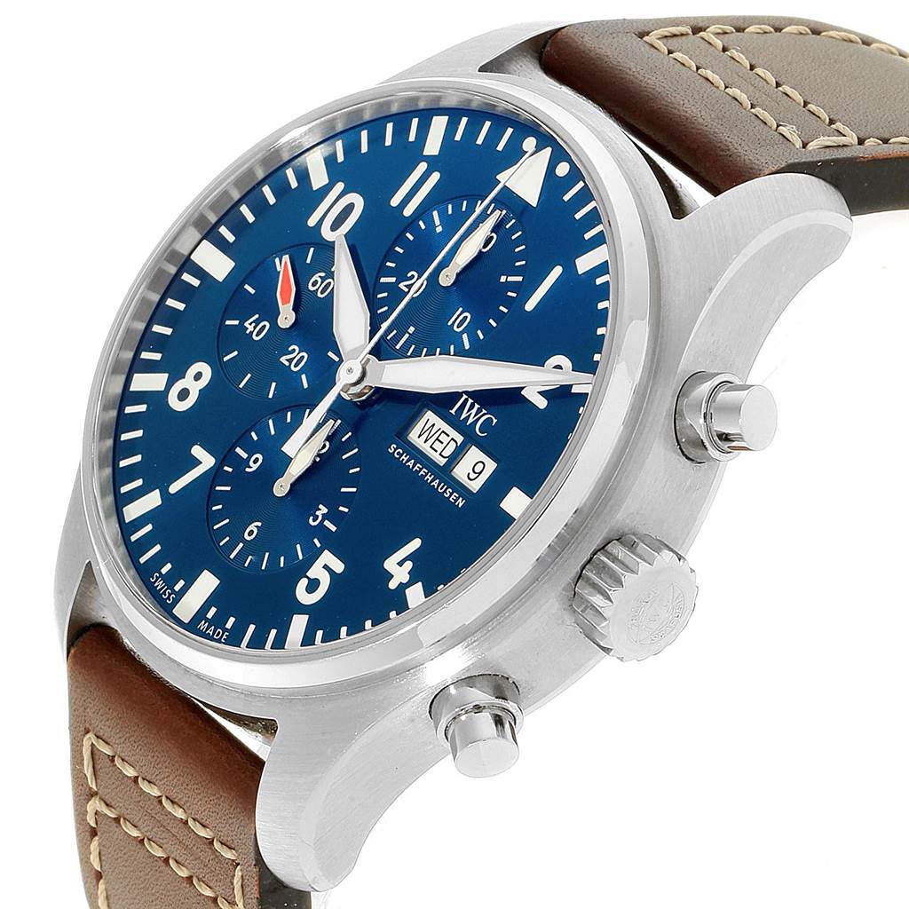 The IWC Pilot IW377714 Men's Stainless Steel Blue Dial IW377714 Men's Stainless Steel Blue Dial model watch is shown at an angled side view, highlighting the blue dial, chronograph sub-dials, and leather strap.