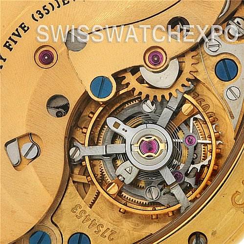This image shows a close-up of the internal mechanism of the IWC Da Vinci IW375203 OR 3752-03 OR 3752-003 Men's Yellow Gold Silver Dial IW375203 OR 3752-03 OR 3752-003 Men's Yellow Gold Silver Dial watch, highlighting its intricate gears and components.