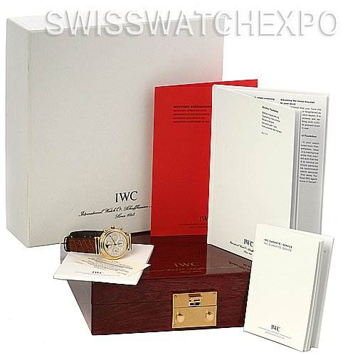 The image shows an IWC Da Vinci IW375203 OR 3752-03 OR 3752-003 Men's Yellow Gold Silver Dial IW375203 OR 3752-03 OR 3752-003 Men's Yellow Gold Silver Dial watch positioned next to its box, manuals, and paperwork from a straight-on view.