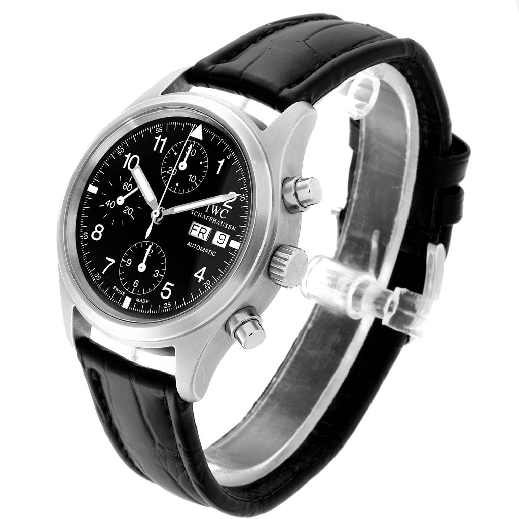 The image shows an IWC Pilot IW370603 Men's Stainless Steel Black Dial IW370603 Men's Stainless Steel Black Dial model watch from a front-left angle, highlighting the dial, crown, pushers, and strap.