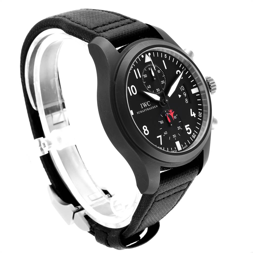 The image shows a side angle of an IWC Pilot IW388001 Men
s Titanium Black Dial IW388001 Men
s Titanium Black Dial model watch, highlighting the black dial, numerals, and textured strap.