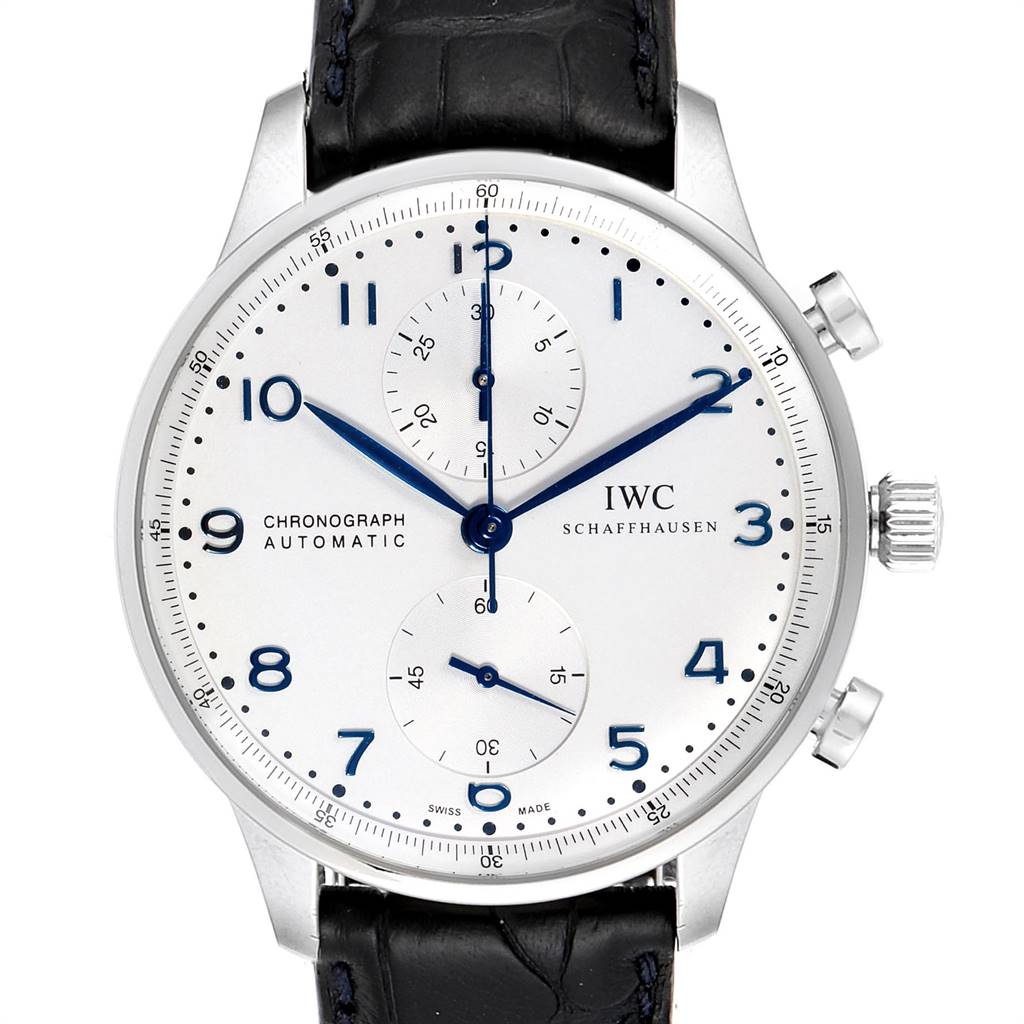 The image shows the front view of an IWC Portuguese IW371446 Men's Stainless Steel Silver Dial IW371446 Men's Stainless Steel Silver Dial Chronograph watch, highlighting its dial, hands, sub-dials, and crown.