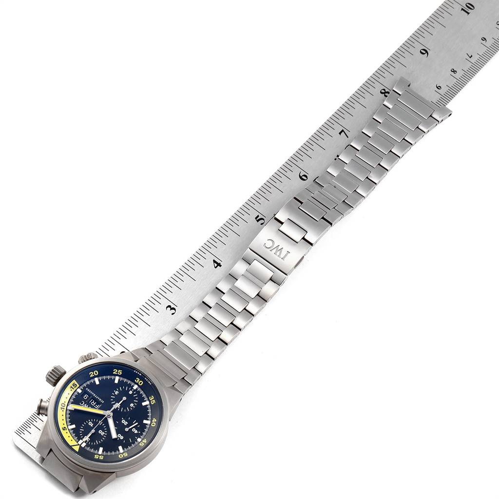 The photo shows the IWC GST IW371903 Men's Titanium Black Dial IW371903 Men's Titanium Black Dial model watch face and metal band, measured with a ruler.