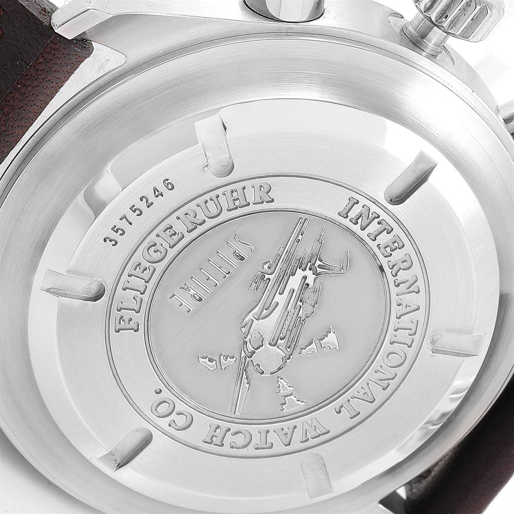 This image shows the back case of the IWC Pilot IW3253005 Men's Stainless Steel Silver Dial IW3253005 Men's Stainless Steel Silver Dial model watch, featuring inscriptions and an engraving.