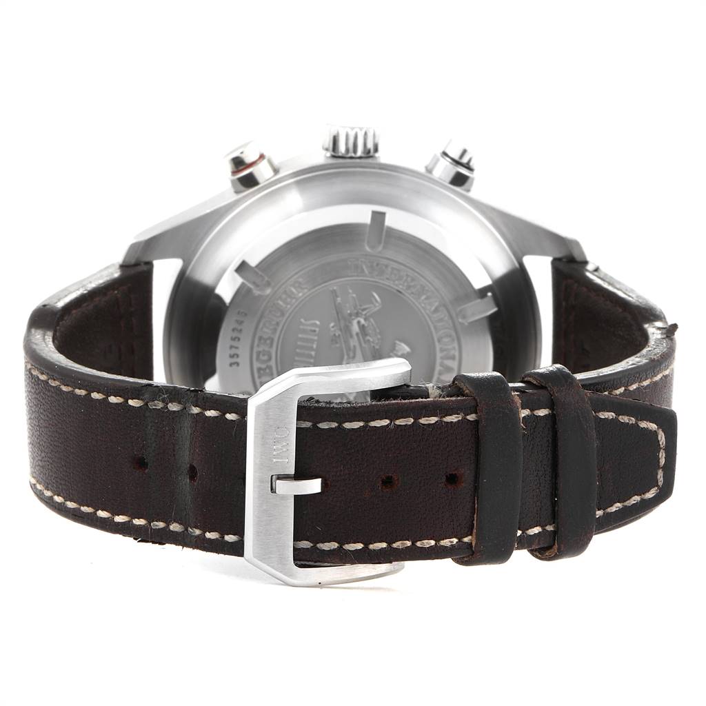 The image shows the back view of the IWC Pilot IW3253005 Men's Stainless Steel Silver Dial IW3253005 Men's Stainless Steel Silver Dial model watch, highlighting the case back and leather strap with the buckle.