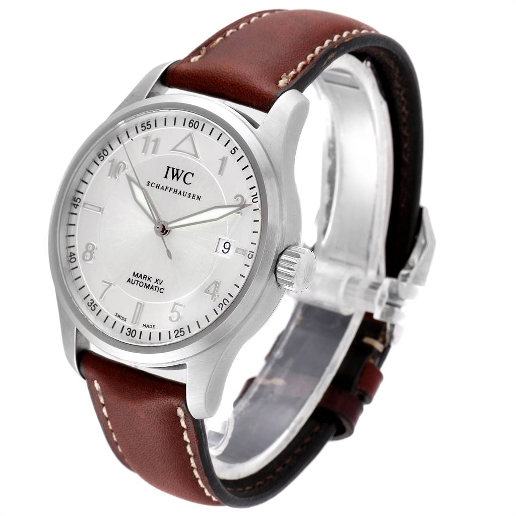 The IWC Pilot IW325313 Men's Stainless Steel Silver Dial IW325313 Men's Stainless Steel Silver Dial model watch is pictured at an angle showing the dial, crown, and brown leather strap.
