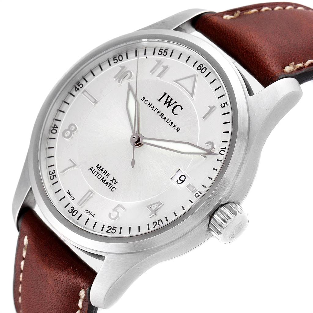 The IWC Pilot IW325313 Men's Stainless Steel Silver Dial IW325313 Men's Stainless Steel Silver Dial Mark XV watch is shown in a close-up angled view, highlighting its dial, crown, case, and part of the leather strap.