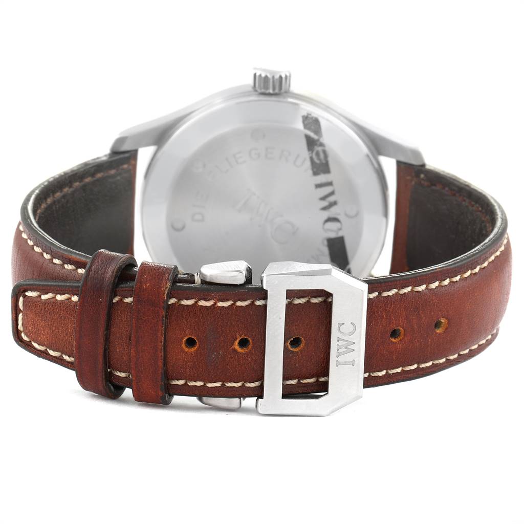 The image shows the back view of an IWC Pilot IW325313 Men's Stainless Steel Silver Dial IW325313 Men's Stainless Steel Silver Dial model watch, focusing on the leather strap and metal buckle.