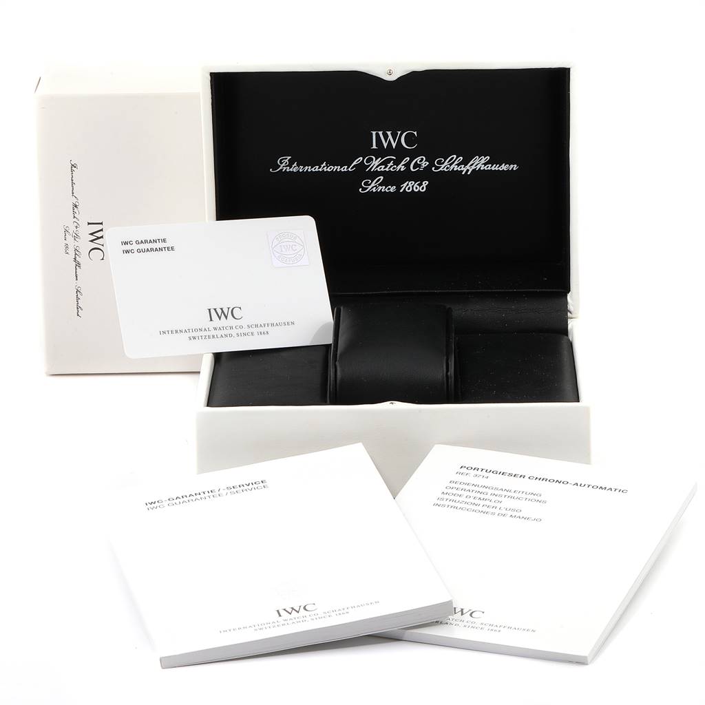 This image shows the packaging and documentation for the IWC Portuguese IW371401 Men's Stainless Steel Silver Dial IW371401 Men's Stainless Steel Silver Dial model watch, including the box, warranty card, and manuals.