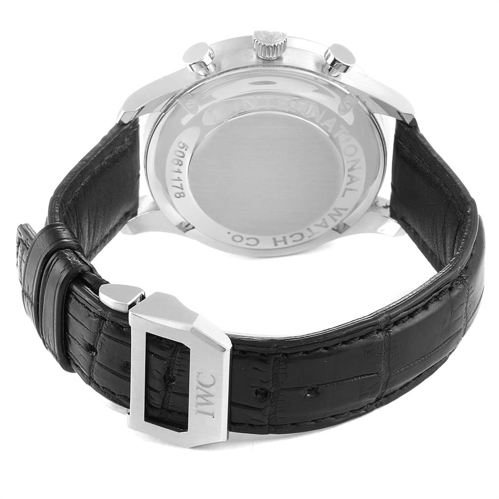 The image shows the back of an IWC Portuguese IW371446 Men's Stainless Steel Silver Dial IW371446 Men's Stainless Steel Silver Dial model watch, featuring the case back, crown, and leather strap with the IWC clasp.