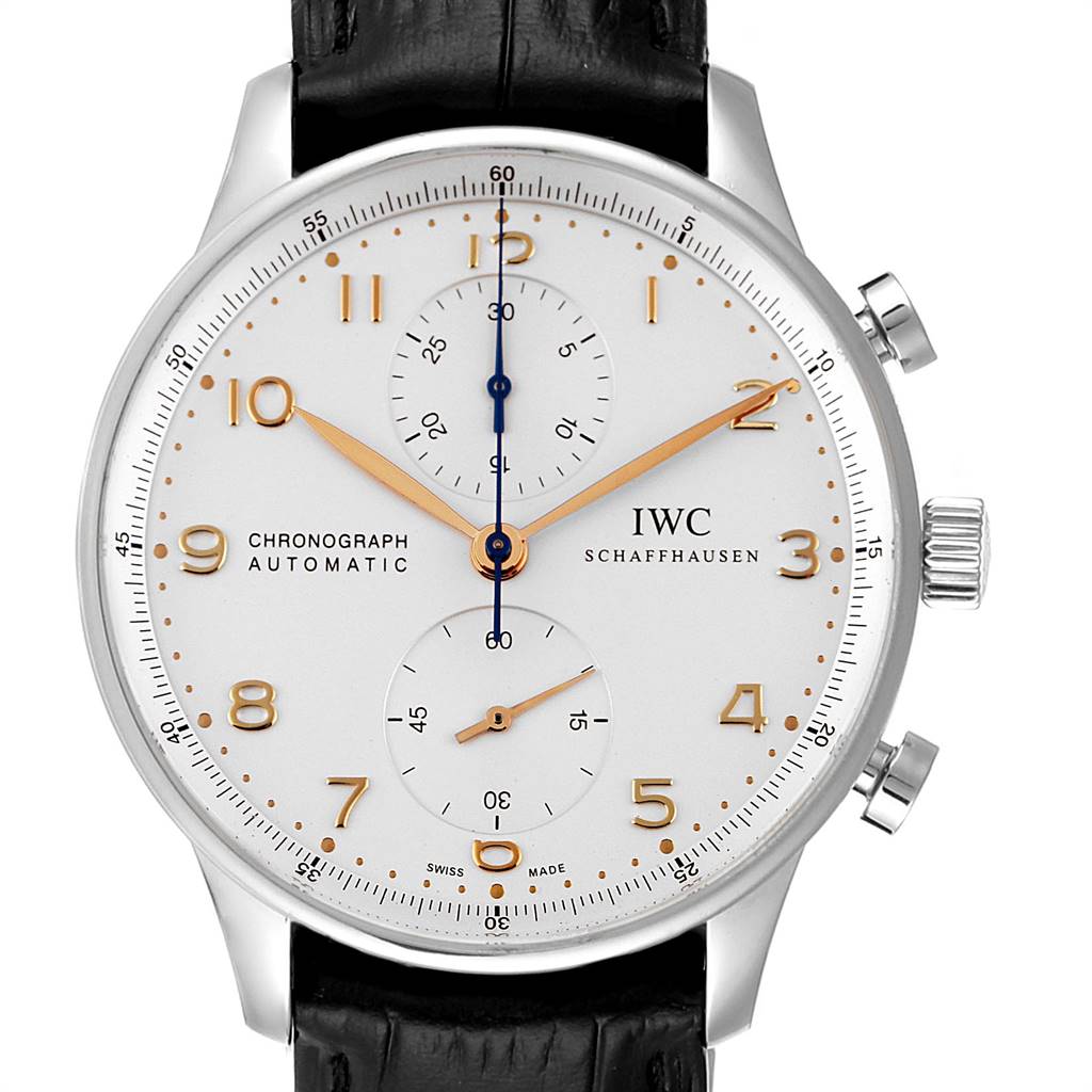 The image shows a front view of the IWC Portuguese IW371445 Men
s Stainless Steel Silver Dial IW371445 Men
s Stainless Steel Silver Dial Chronograph Automatic watch with a black leather strap and gold-colored numerals.