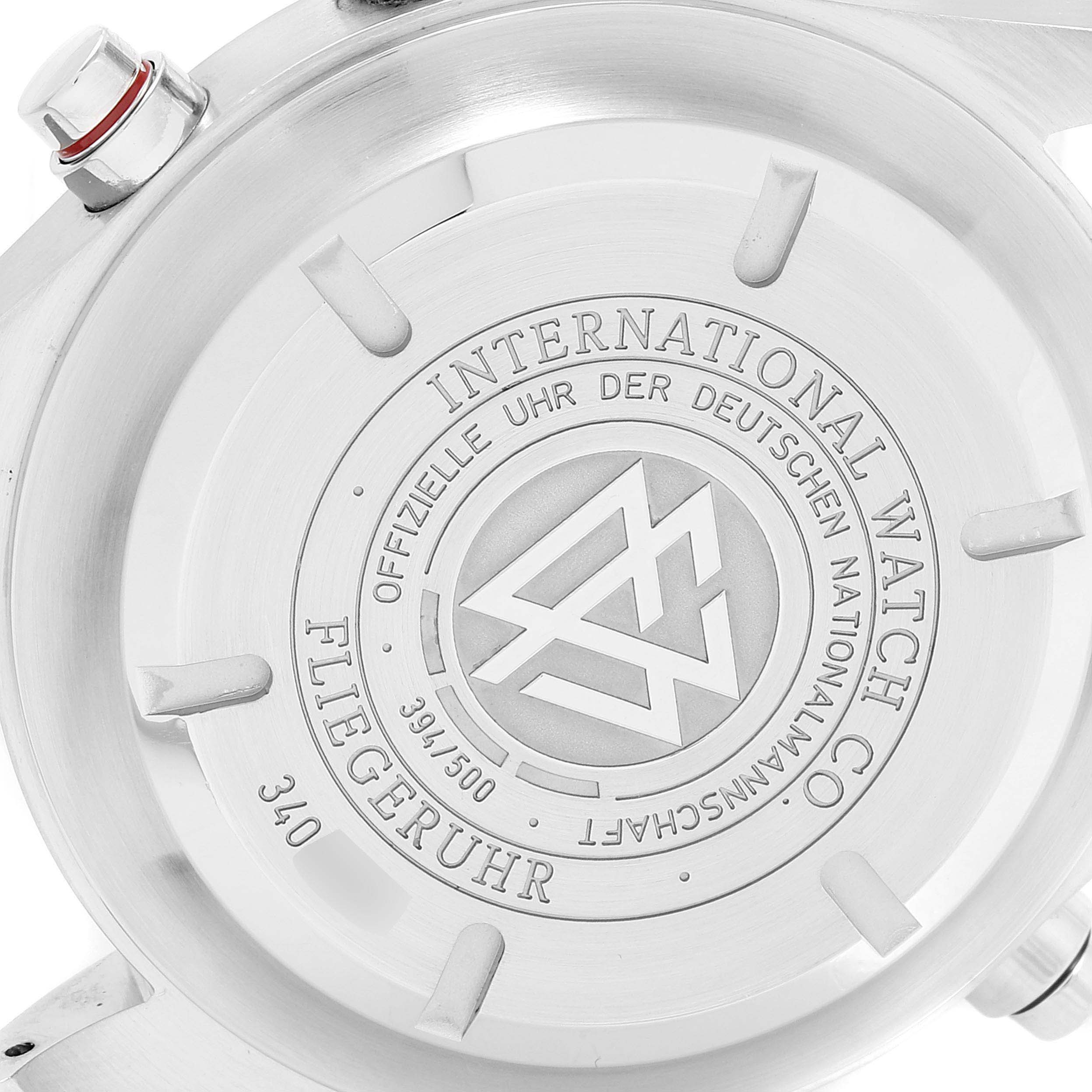 The image shows the case back of an IWC Pilot IW371803 Men's Stainless Steel White Dial IW371803 Men's Stainless Steel White Dial model watch, detailing its engraved markings.