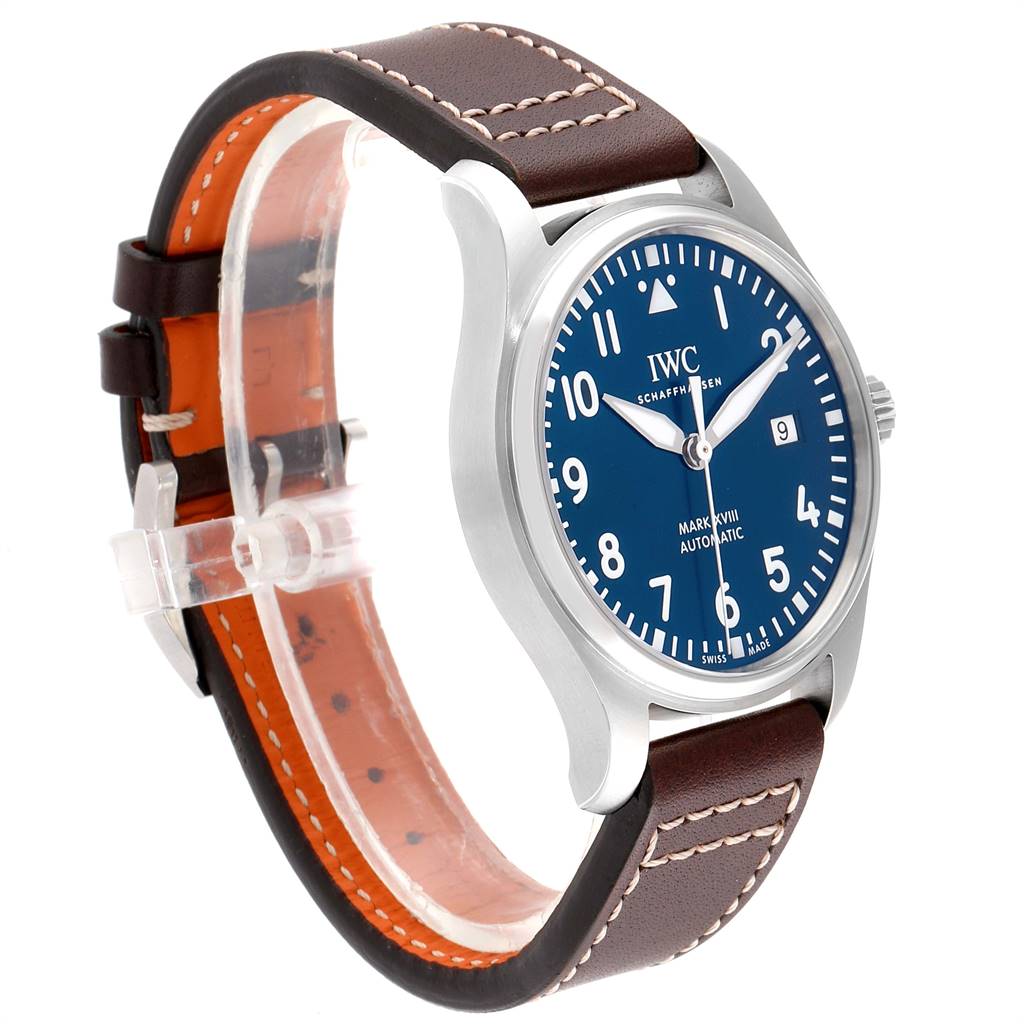 The IWC Pilot IW327004 Men's Stainless Steel Blue Dial IW327004 Men's Stainless Steel Blue Dial model watch is shown at an angled side view, displaying its blue dial, stainless steel case, and brown leather strap.