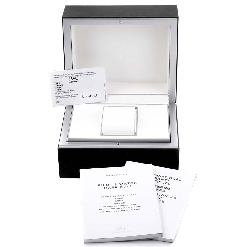 The image shows the packaging box, warranty card, and manuals for the IWC Pilot IW327004 Men's Stainless Steel Blue Dial IW327004 Men's Stainless Steel Blue Dial's Watch Mark XVIII.