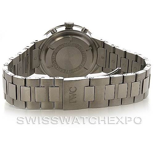This image shows the back view of a Vintage IWC watch, highlighting its metal bracelet and clasp.