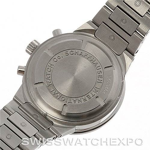 The image shows the back view of the Vintage IWC watch, highlighting the case back and stainless steel bracelet.