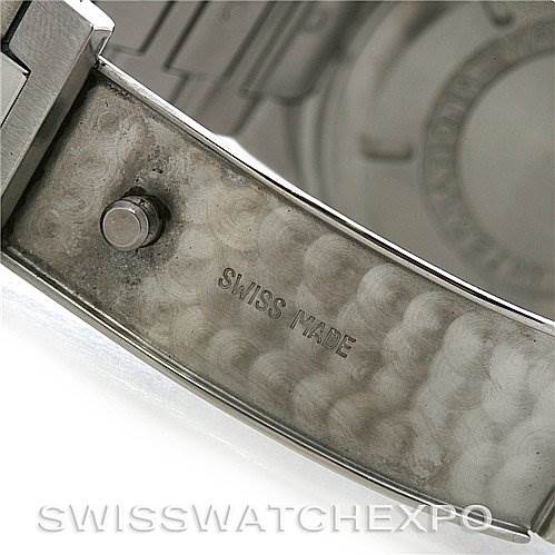 The image shows the inner clasp and part of the bracelet of a Vintage IWC watch with "Swiss Made" engraved.