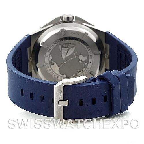 The image shows the back of an IWC Ingenieur IW323608 Men's Stainless Steel White Dial IW323608 Men's Stainless Steel White Dial watch, featuring its case back and blue rubber strap with a metal buckle.