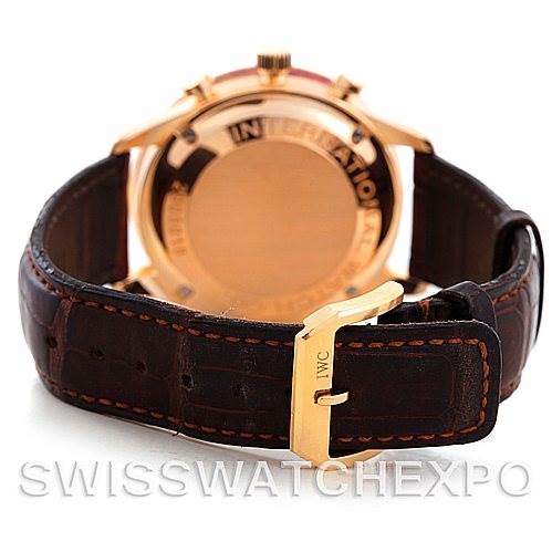 The image shows the back and strap buckle of an IWC Portuguese IW3714-15 Men's Rose Gold Black Dial IW3714-15 Men's Rose Gold Black Dial model watch, with a focus on its leather band and gold clasp.