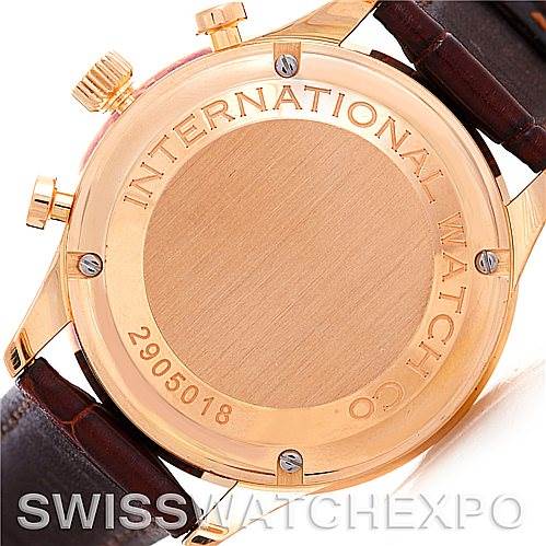 This image shows the back of an IWC Portuguese IW3714-15 Men's Rose Gold Black Dial IW3714-15 Men's Rose Gold Black Dial model watch, highlighting the case back, crown, pushers, and part of the leather strap.