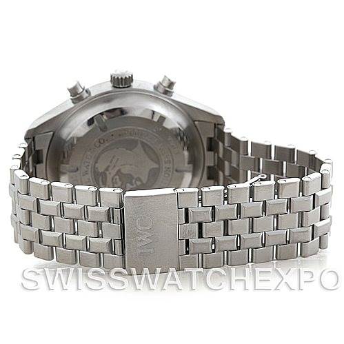 The image shows the back view of an IWC Pilot Men
s Stainless Steel Black Dial Men
s Stainless Steel Black Dial watch, displaying the case back, crown, chronograph pushers, and bracelet with clasp.