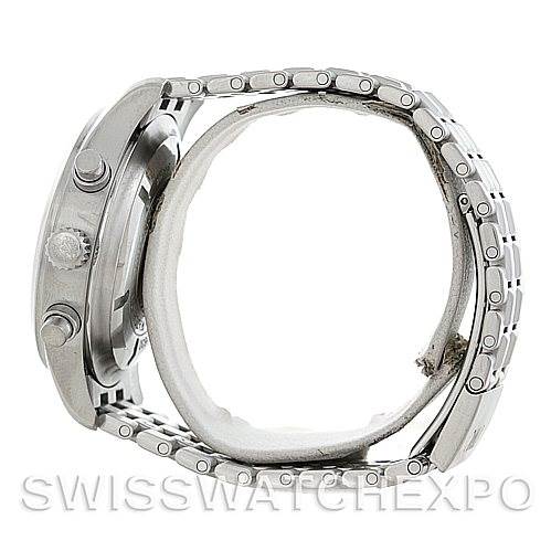 The image shows a side view of the IWC Pilot Men
s Stainless Steel Black Dial Men
s Stainless Steel Black Dial model watch, highlighting the stainless steel case, buttons, and metal bracelet.