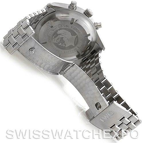 The image shows the IWC Pilot Men
s Stainless Steel Black Dial Men
s Stainless Steel Black Dial watch model from the back, focusing on the case back and metal bracelet with the clasp open.