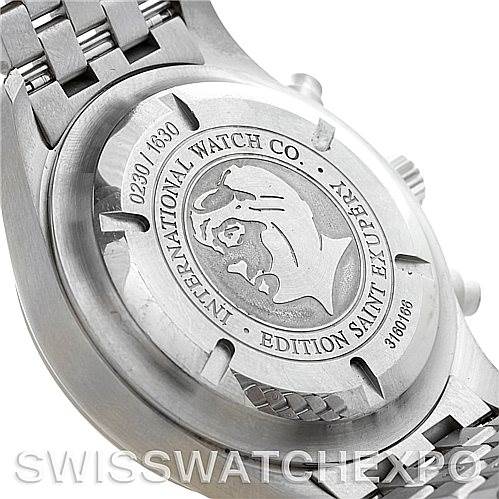 The image shows the back case of the IWC Pilot Men
s Stainless Steel Black Dial Men
s Stainless Steel Black Dial model watch, highlighting its engravings and serial number.