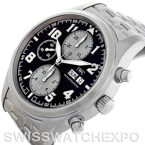 This image shows an angled view of the IWC Pilot Men
s Stainless Steel Black Dial Men
s Stainless Steel Black Dial model watch, highlighting its stainless steel case, chronograph dials, and bracelet.