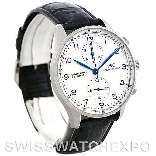 The image displays a frontal angled view of an IWC Portuguese IW371417 Men
s Stainless Steel Silver Dial IW371417 Men
s Stainless Steel Silver Dial model watch, showcasing its dial, hands, and leather strap.