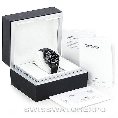 The image shows an IWC Pilot IW378901 Men's Titanium Black Dial IW378901 Men's Titanium Black Dial model watch in its original packaging, along with accompanying booklets and documents.