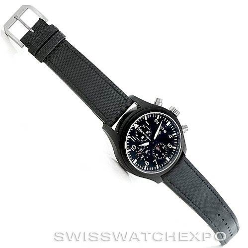 The image shows an overhead view of the IWC Pilot IW378901 Men's Titanium Black Dial IW378901 Men's Titanium Black Dial model watch, displaying the face, strap, buckle, and side pushers.