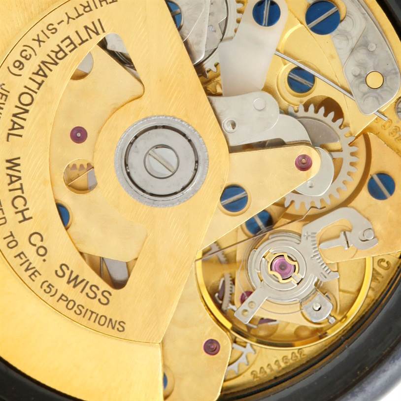 This close-up image shows the intricate internal mechanics of the IWC Da Vinci 3755 Men's Yellow Gold White Dial 3755 Men's Yellow Gold White Dial watch movement.